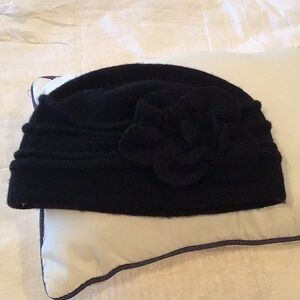 Black hat with flower on it